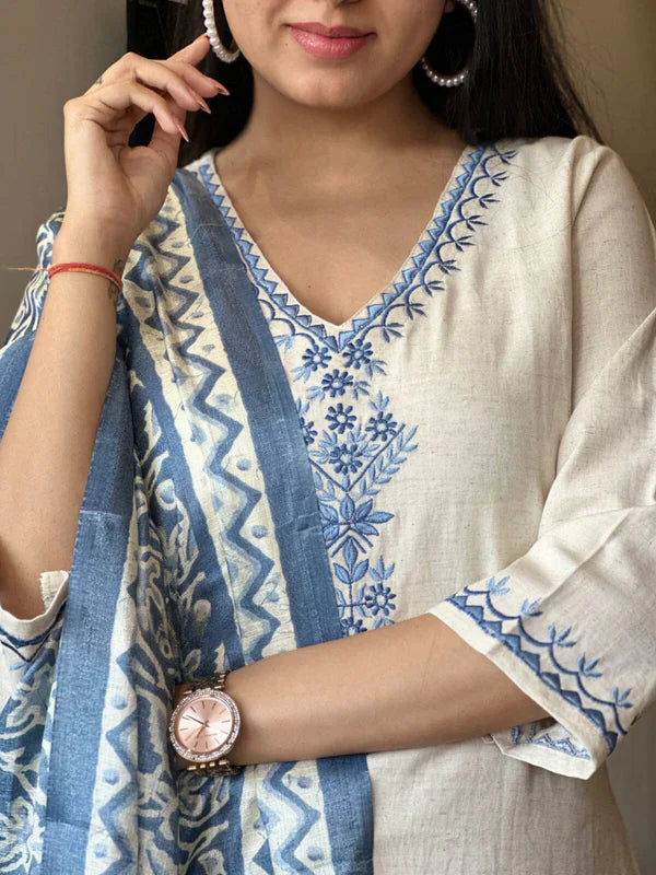 white cotton suit with blue embroidery and printed dupatta