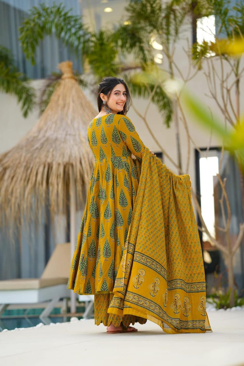elegant mustard green ethnic ensemble with leaf motif