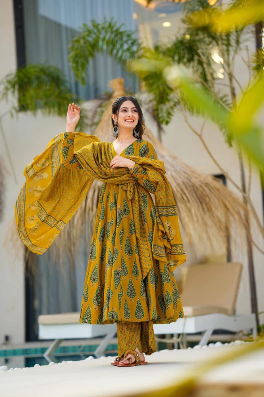 elegant mustard green ethnic ensemble with leaf motif