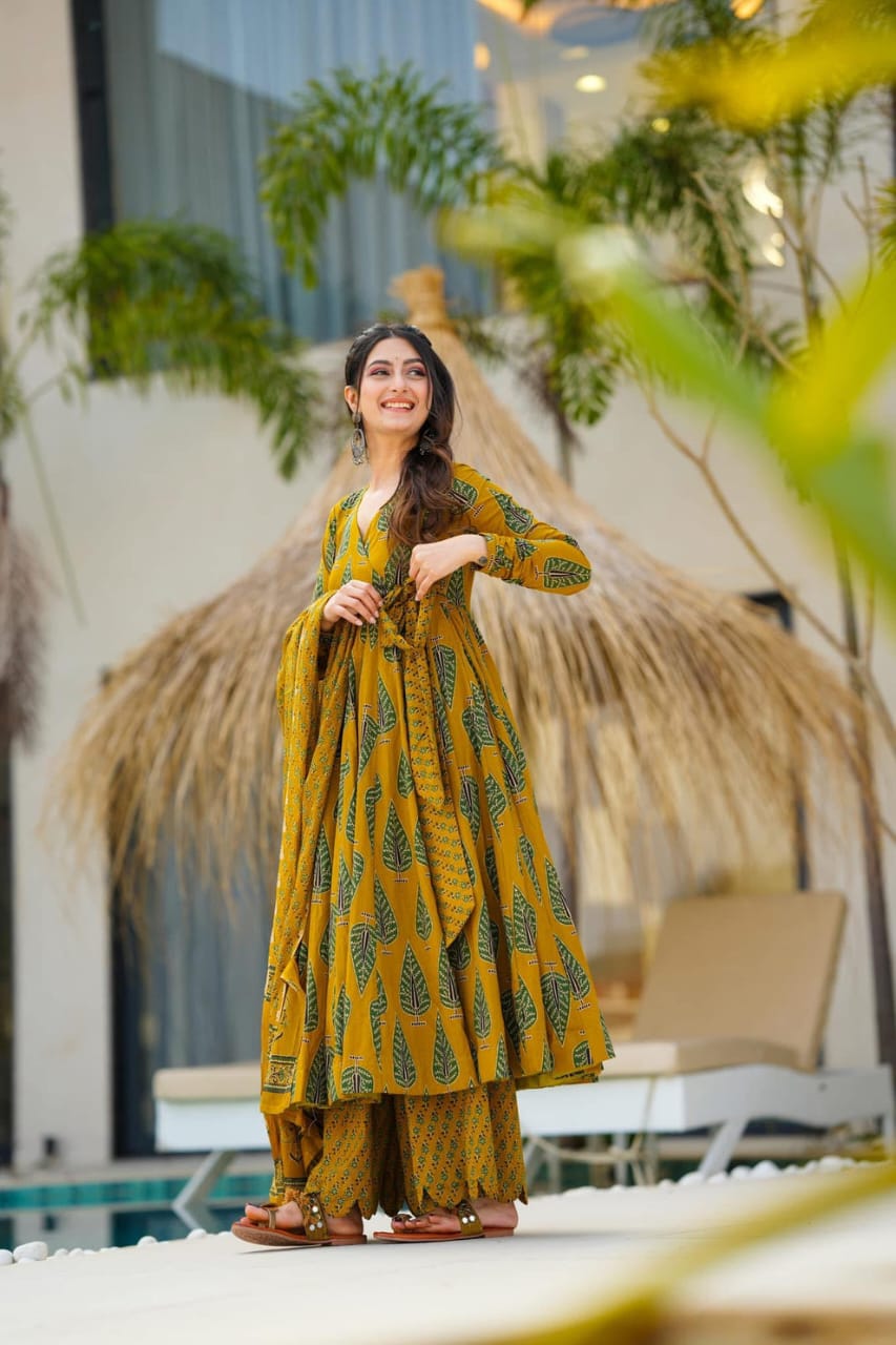 elegant mustard green ethnic ensemble with leaf motif