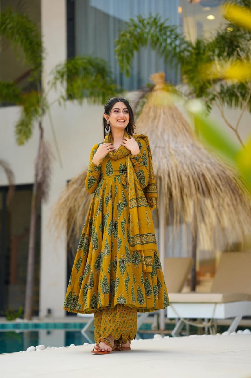 elegant mustard green ethnic ensemble with leaf motif