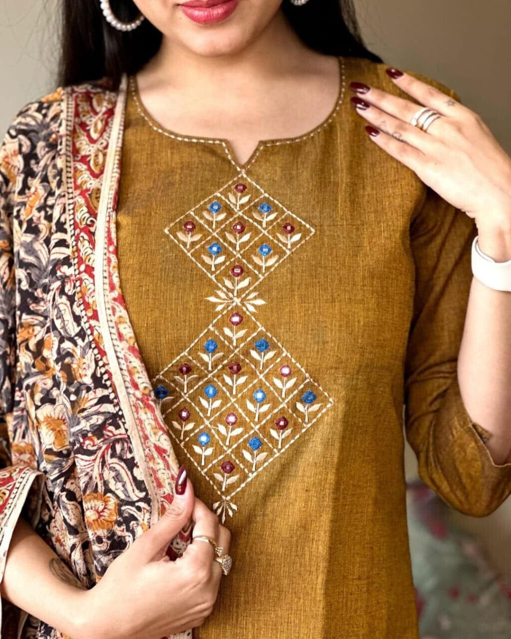 mustard brown embroidered kurta set with floral dupatta