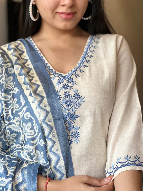 white cotton suit with blue embroidery and printed dupatta